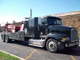 towing service evansville Malik Heavy Duty Towing