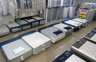 The big room of mattresses on display at Best Value Mattress Indianapolis. 